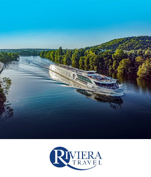 Riviera Travel: Luxury river cruise ship sailing in idyllic landscape