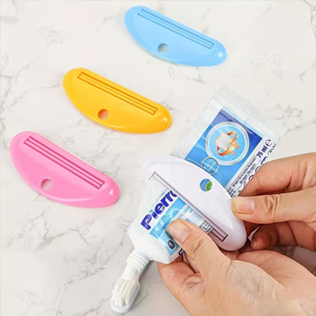 Toothpaste squeezer on tube with various colour options