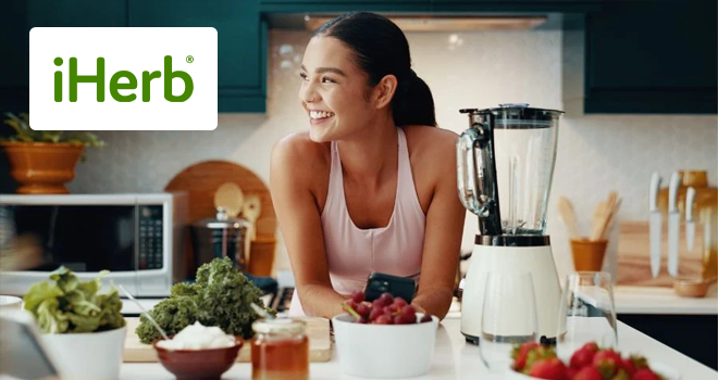 iHerb - Woman in kitchen space surrounded by healthy ingredients