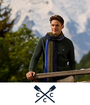 Crew Clothing - Man wearing forest green jumper with scarf