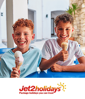 Jet2Holidays - Two boys smiling and eating ice cream in a resort