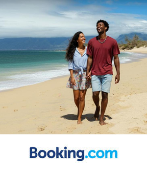 Booking.com - Couple walking on the beach