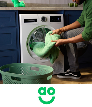 AO - Man emptying a washing load into a laundry basket