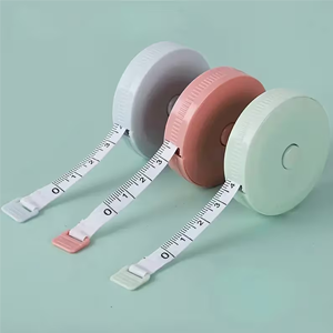 Tape measures in various pastel colours