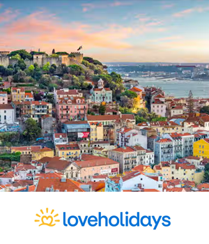 loveholidays - European cityscape with sun setting in background