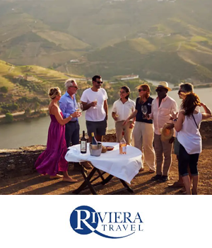 Riviera Travel - Tourists gather drinking wine next to the Riviera