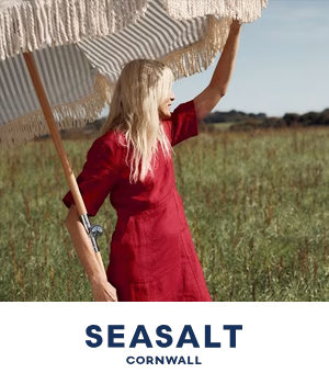 Seasalt - Woman wearing a red dress holding a parasol