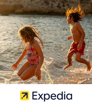 Expedia - Children having fun playing in the sea