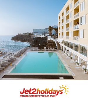 Jet2Holidays - Hotel with pool, views of the sea in the background