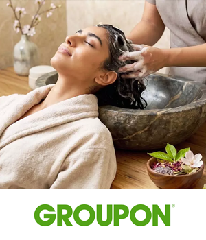 Groupon - Woman enjoying a head massage at a spa