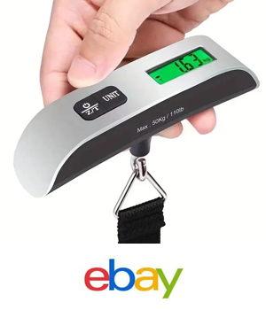 eBay - Person holding a luggage scale with weight displayed on front screen