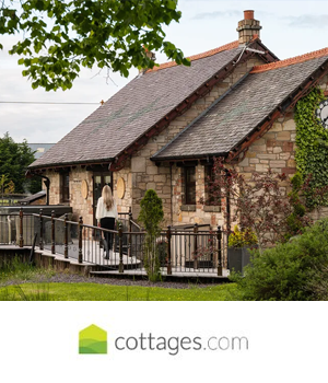 Cottages.com - Woman walks across patio in a modern cottage