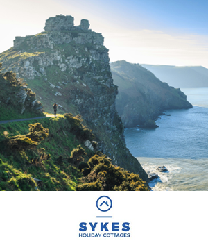 Sykes Holiday Cottages - Man hiking in the cliffs of Devon