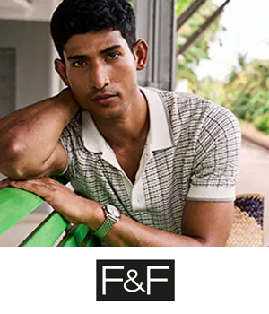 F&F - Man wearing a patterned beige polo shirt