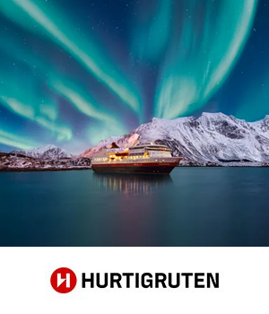 Hurtigruten - Boat sails through Norweigan landscape with Northern Lights above