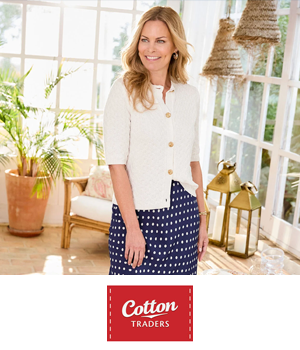 Cotton Traders - Woman wearing a cardigan and dotted skirt
