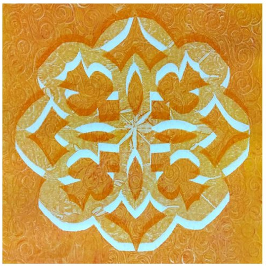 a piece of orange paper with a geometric pattern on it