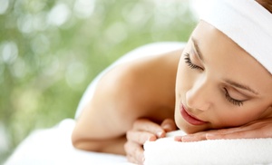 Relax with 30 Reflexology, 60-Minute Massage & Hot Stone