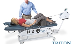 Chiropractic exam with adjustments and decompression therapy