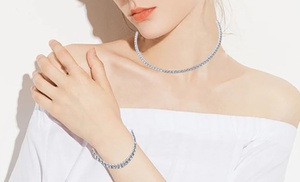 Parure con collana, bracciale e orecchini con cristalli Swarovski® Parure con collana, bracciale e orecchini con cristalli Swarovski®