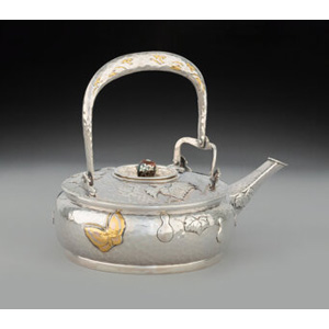 A Tiffany & Co. Silver and Mixed Metal Tea Pot, New York, circa 1878 Marks: TIFFANY & CO., 5046 M 2259, STERLING SILVER A