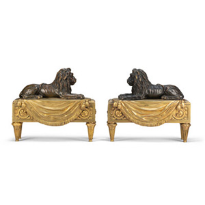 A Pair of Empire-Style Gilt and Patinated Bronze Chenets In the Manner of Pierre-Philippe Thomire, early 19th century 12 x ... (Total: 2 Items)