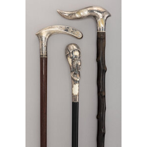 A Collection of Three Mother-of-Pearl, Silver-Mounted, and Carved Wood Canes 39 x 1-3/8 inches (99.1 x 3.5 cm)