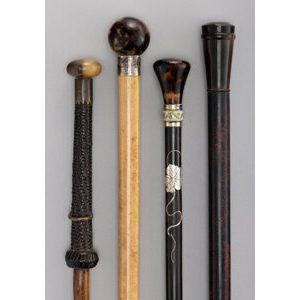 Four Guilloché Enameled, Silver-Inlaid, and Carved Wood Canes, circa 1887 and later 35-3/4 x 1-1/2 x 1-1/2 inches (90.8 x 3... (Total: 4 Items)