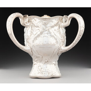 A Gorham Mfg. Co. Martelé Partial Gilt Silver Three-Handle Trophy Cup, Providence, Rhode Island, 1905 Marks: Martelé, (eagle), (lion-anchor-G), 9584, H/WA