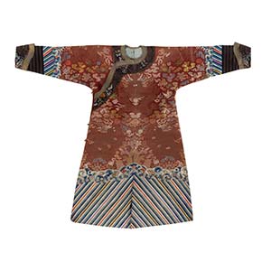 A Chinese Kesi Ocre-Ground 'Dragon' Robe, Jifu, late 18th/early 19th century 54 x 69-1/4 inches (137.2 x 175.9 cm) 