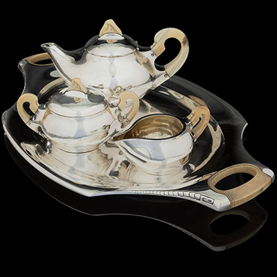 A Rare Four-Piece Henry van de Velde Partial Gilt Silver Tea Set, circa 1905