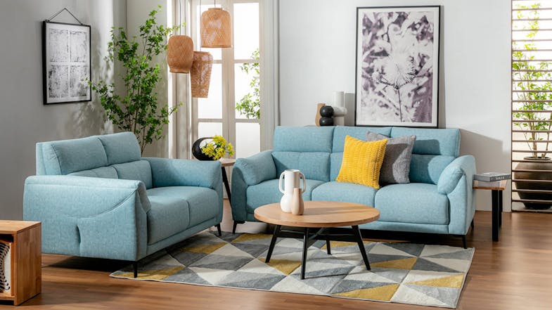 Casual beige sneakers with yellow accents and a chunky sole.