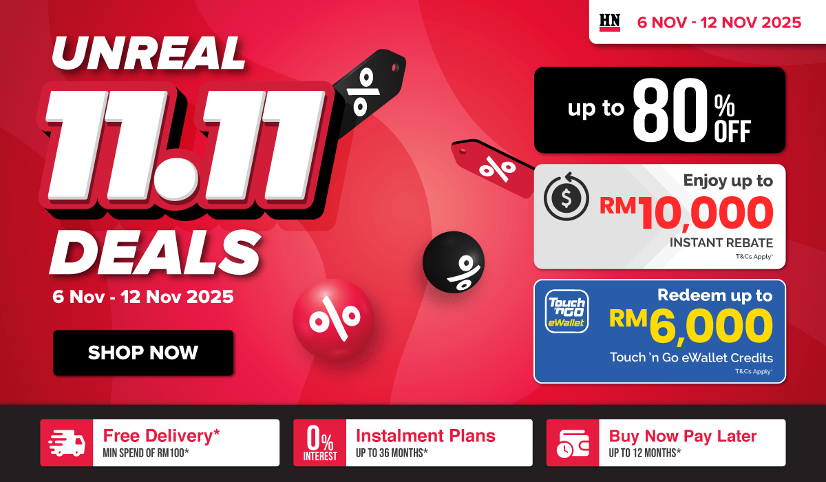 Three women enjoying a shopping day, carrying multiple colorful shopping bags while walking together outdoors.