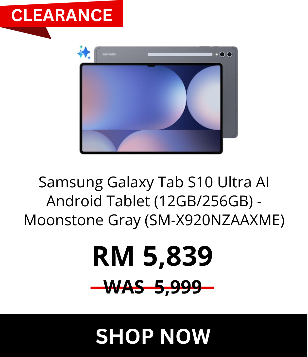 Man in a gray blazer over a dark gray shirt standing on stairs in an urban background.