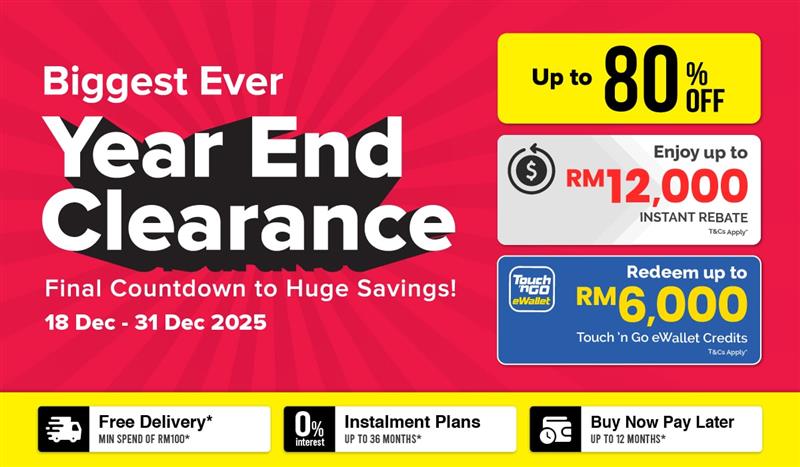 Three women enjoying a shopping day, carrying multiple colorful shopping bags while walking together outdoors.