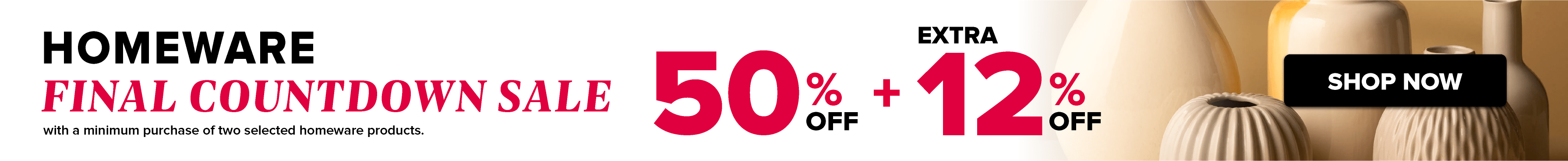 Three women enjoying a shopping day, carrying multiple colorful shopping bags while walking together outdoors.