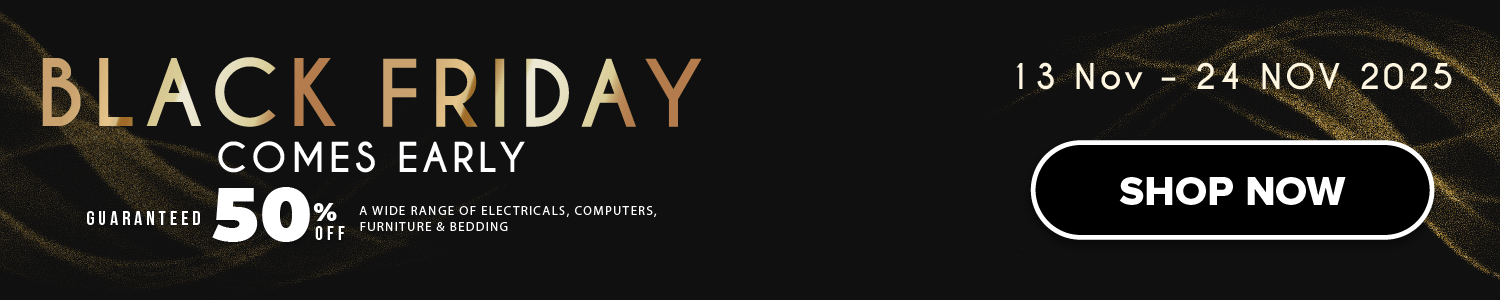 Three women enjoying a shopping day, carrying multiple colorful shopping bags while walking together outdoors.