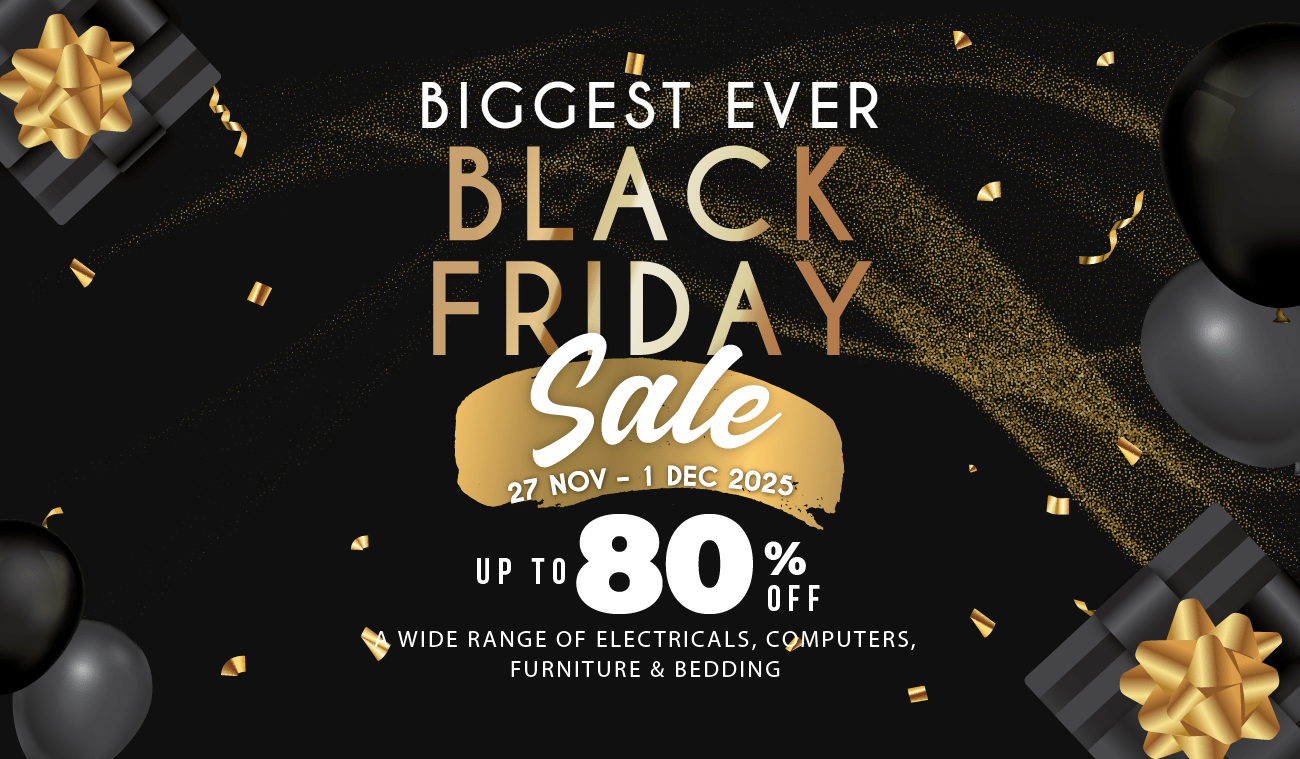 Three women enjoying a shopping day, carrying multiple colorful shopping bags while walking together outdoors.