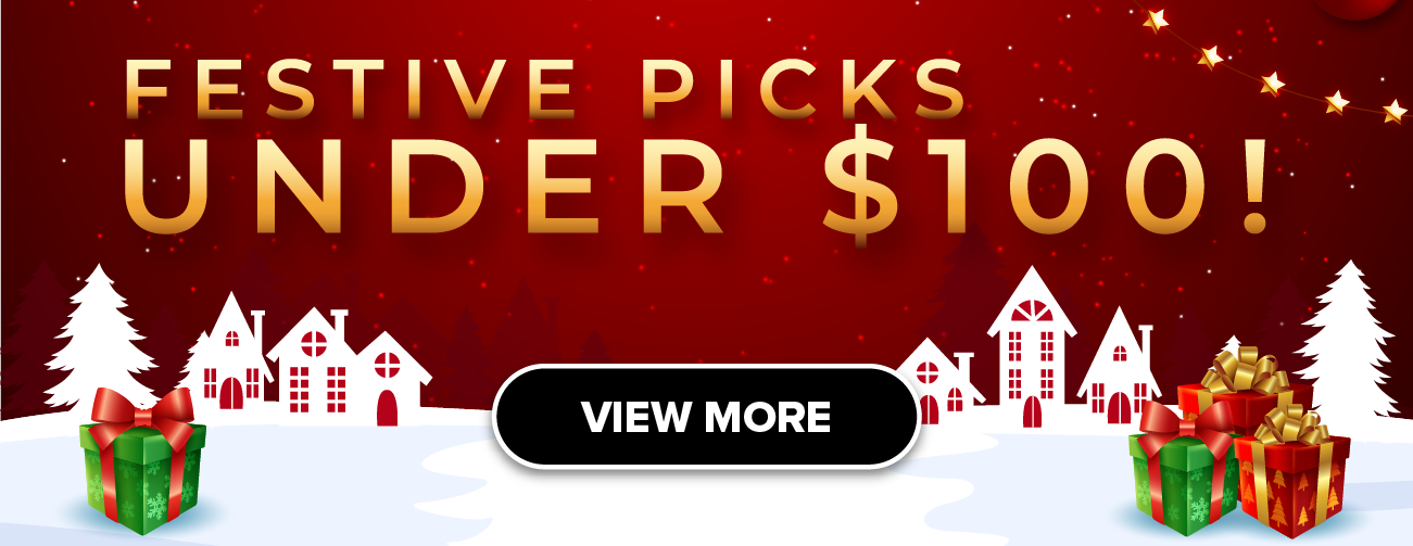 Woman wearing an olive green blazer and light blue jeans walking in an urban setting.