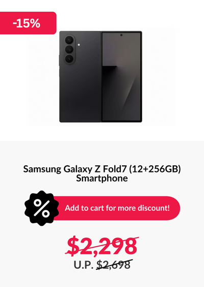 Man in a gray blazer over a dark gray shirt standing on stairs in an urban background.