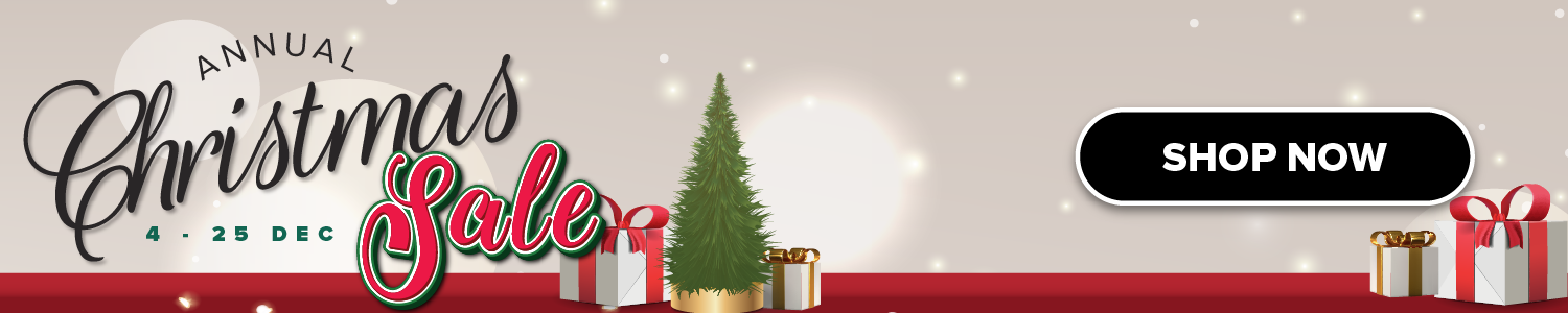 Three women enjoying a shopping day, carrying multiple colorful shopping bags while walking together outdoors.