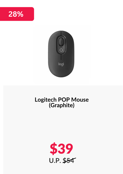 Woman wearing an olive green blazer and light blue jeans walking in an urban setting.