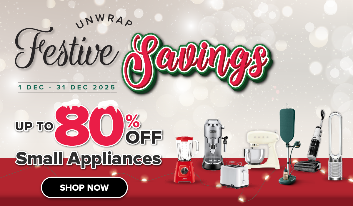 Three women enjoying a shopping day, carrying multiple colorful shopping bags while walking together outdoors.