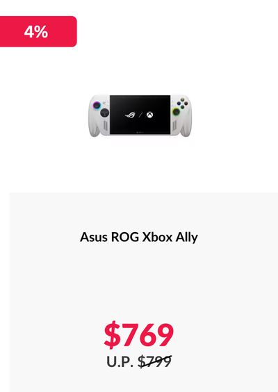 Woman wearing an olive green blazer and light blue jeans walking in an urban setting.