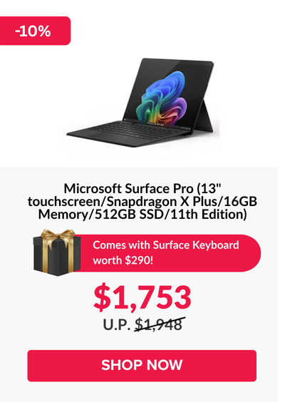 Man in a gray blazer over a dark gray shirt standing on stairs in an urban background.