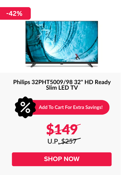 Man in a gray blazer over a dark gray shirt standing on stairs in an urban background.