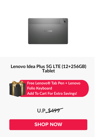 Man in a gray blazer over a dark gray shirt standing on stairs in an urban background.