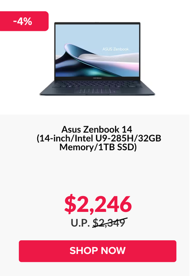 Man in a gray blazer over a dark gray shirt standing on stairs in an urban background.