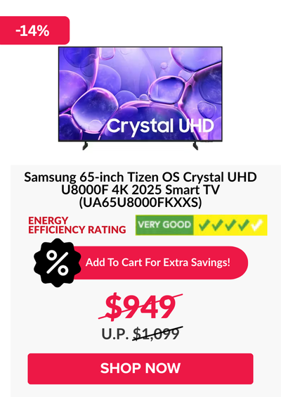 Man in a gray blazer over a dark gray shirt standing on stairs in an urban background.