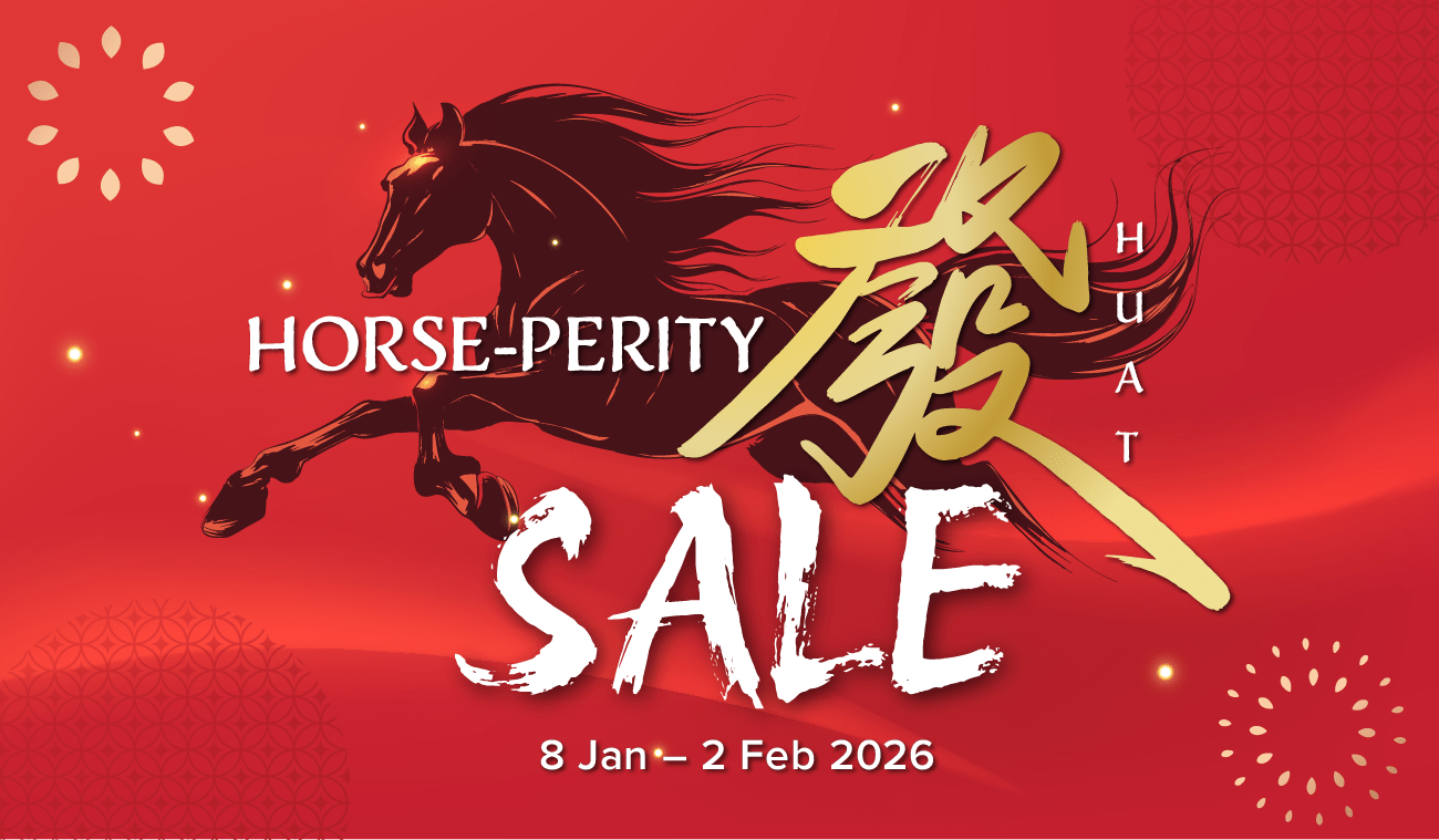 Three women enjoying a shopping day, carrying multiple colorful shopping bags while walking together outdoors.